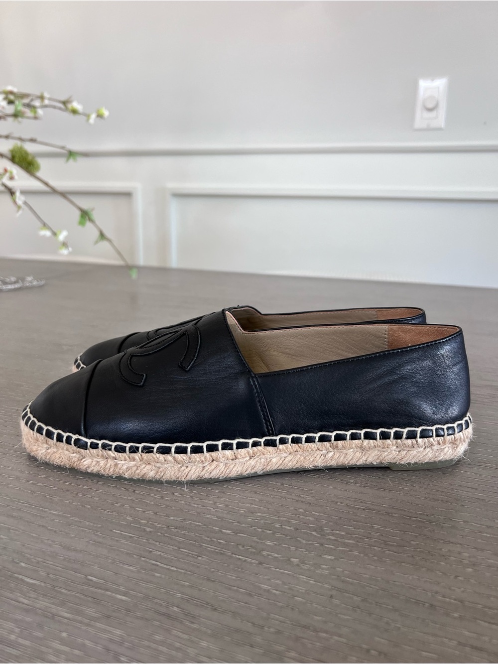 CHANEL Black Leather Ballet Flat with Embossed Logo